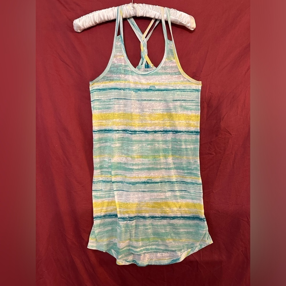 Girl’s swim coverup size large. White, green, yellow. Good pre owned shape